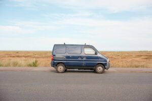 A van is parked on the side of the road